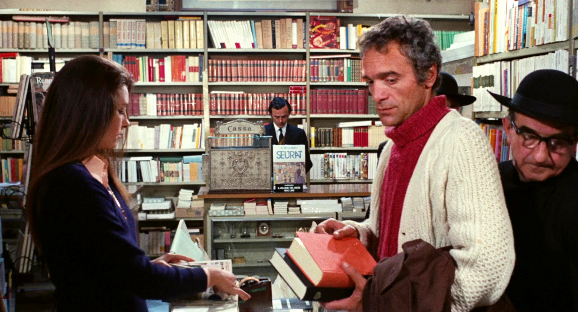 Il tuo vizio (1972) Old priest in library b.jpg