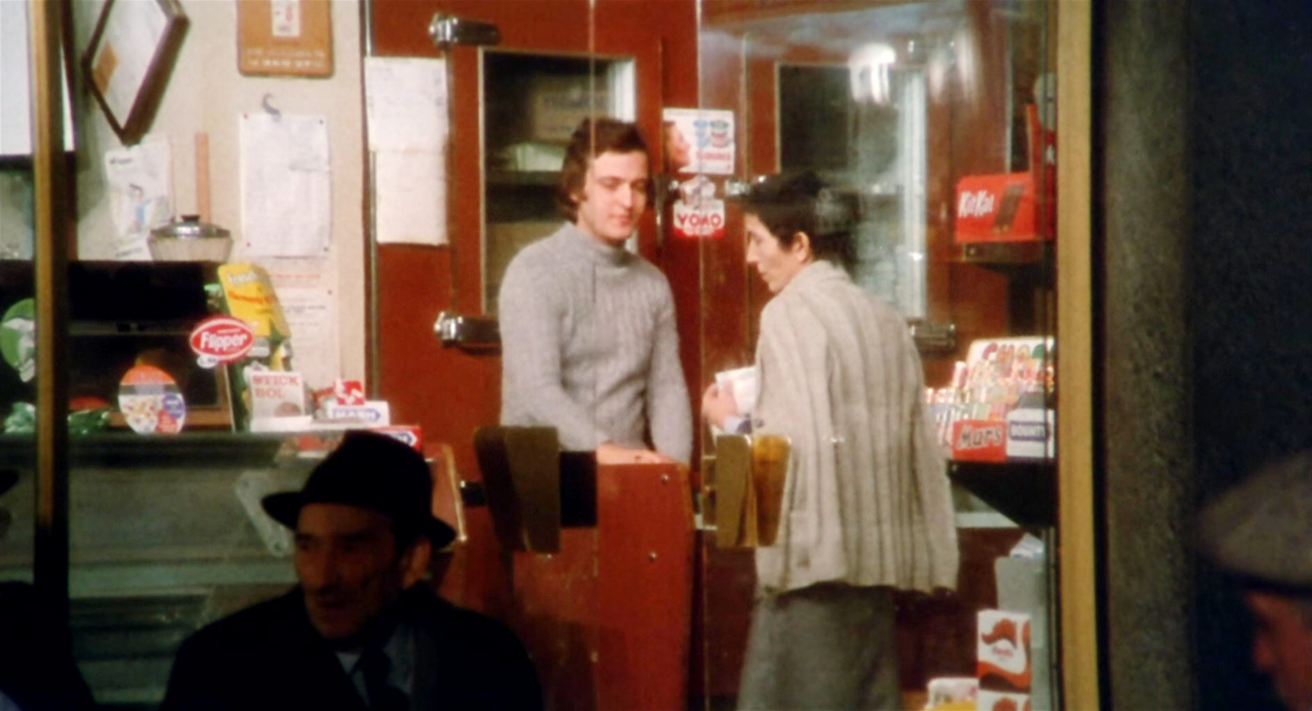Appassionata (1974) Barman and customer outside.jpg