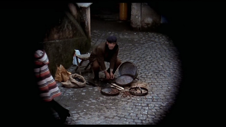 Passi di danza su una lama di rasoio (1973) The chestnut vendor seen by telescope 1.jpg