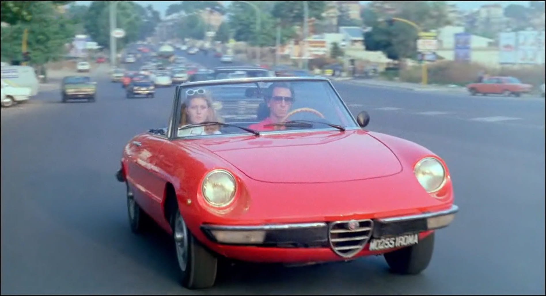 1980 _ Una Vacanza Bestiale _ Automobilista Alla Guida Dell'alfa Romeo Spider _ Non Accreditato _ 01.jpg